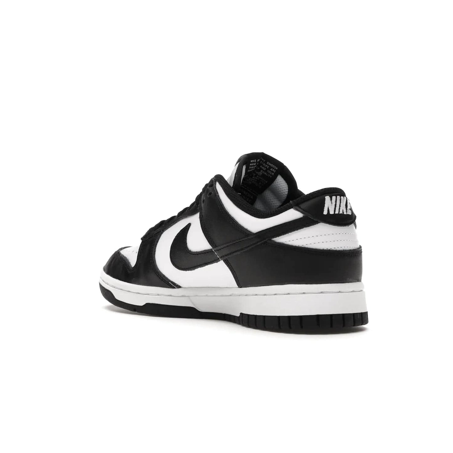 Nike Dunk Low Retro White Black Panda (2021) (Women's) - Image 24 - Only at www.BallersClubKickz.com - Say hello to the new Nike Dunk Low Retro White Black Panda (2021) (Women's)! White & black leather upper with Nike Swoosh logo. Get your pair for $100 in March 2021! Shop now!