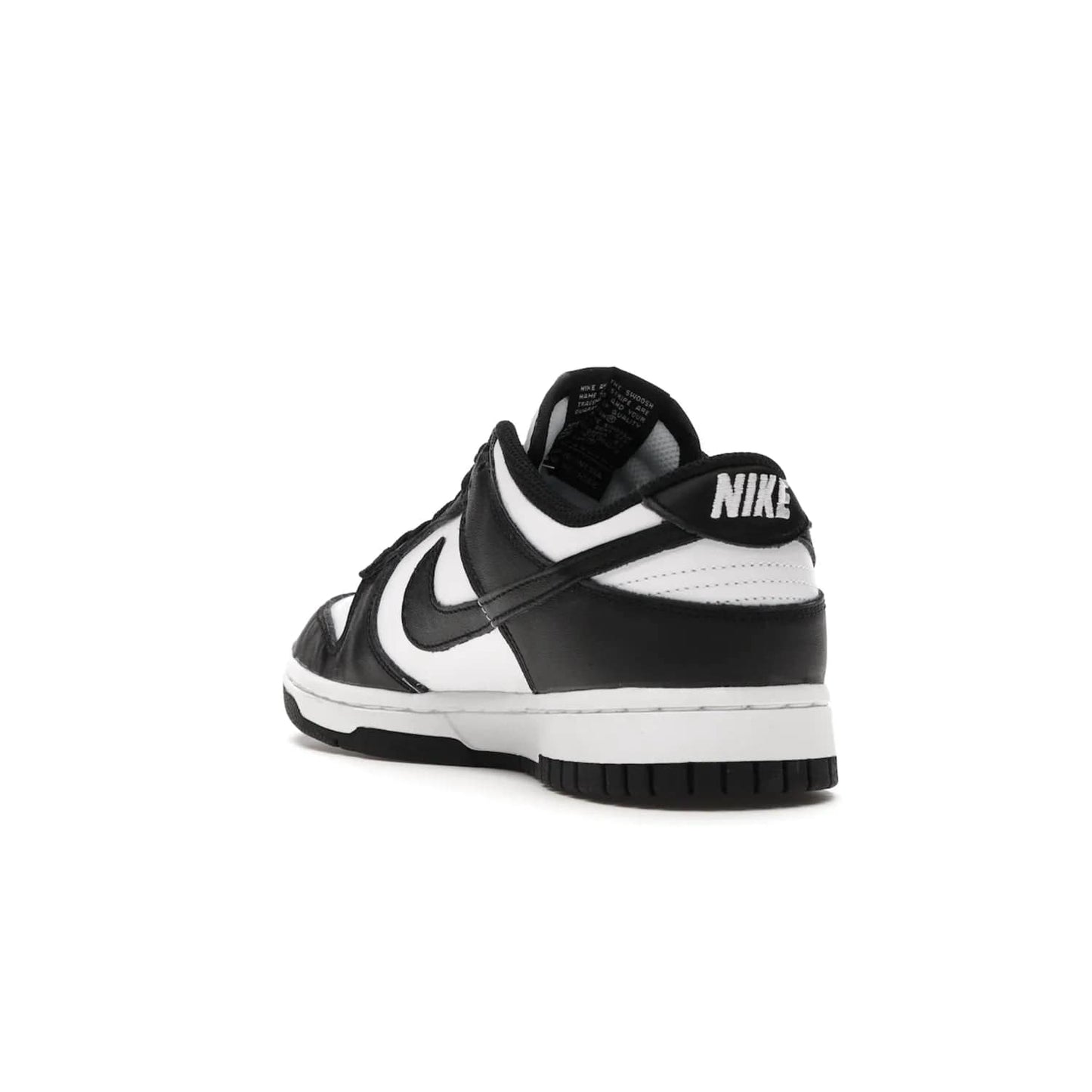 Nike Dunk Low Retro White Black Panda (2021) (Women's) - Image 25 - Only at www.BallersClubKickz.com - Say hello to the new Nike Dunk Low Retro White Black Panda (2021) (Women's)! White & black leather upper with Nike Swoosh logo. Get your pair for $100 in March 2021! Shop now!